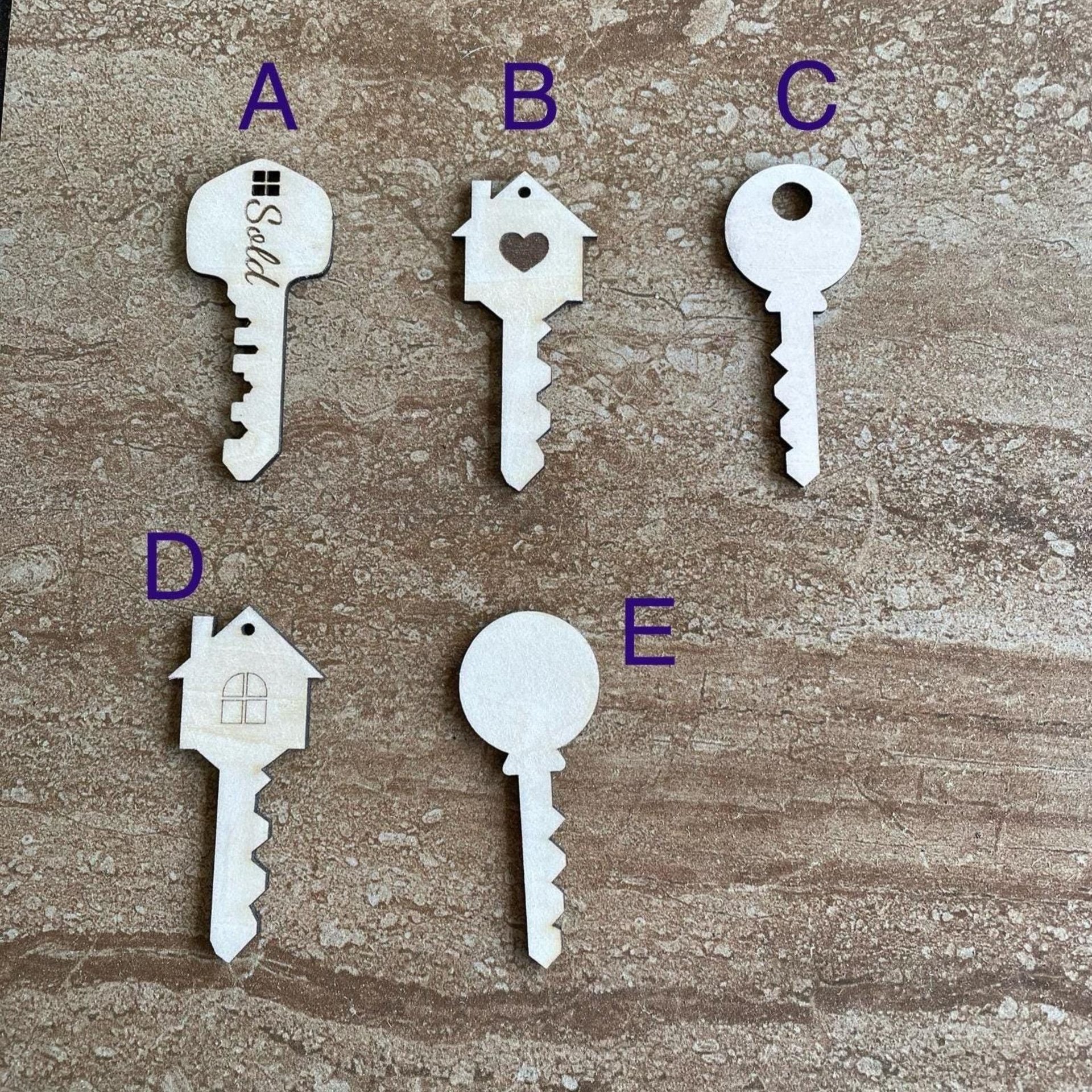 Handmade wooden DIY key cutout in five unique styles, ready for paint or decorating