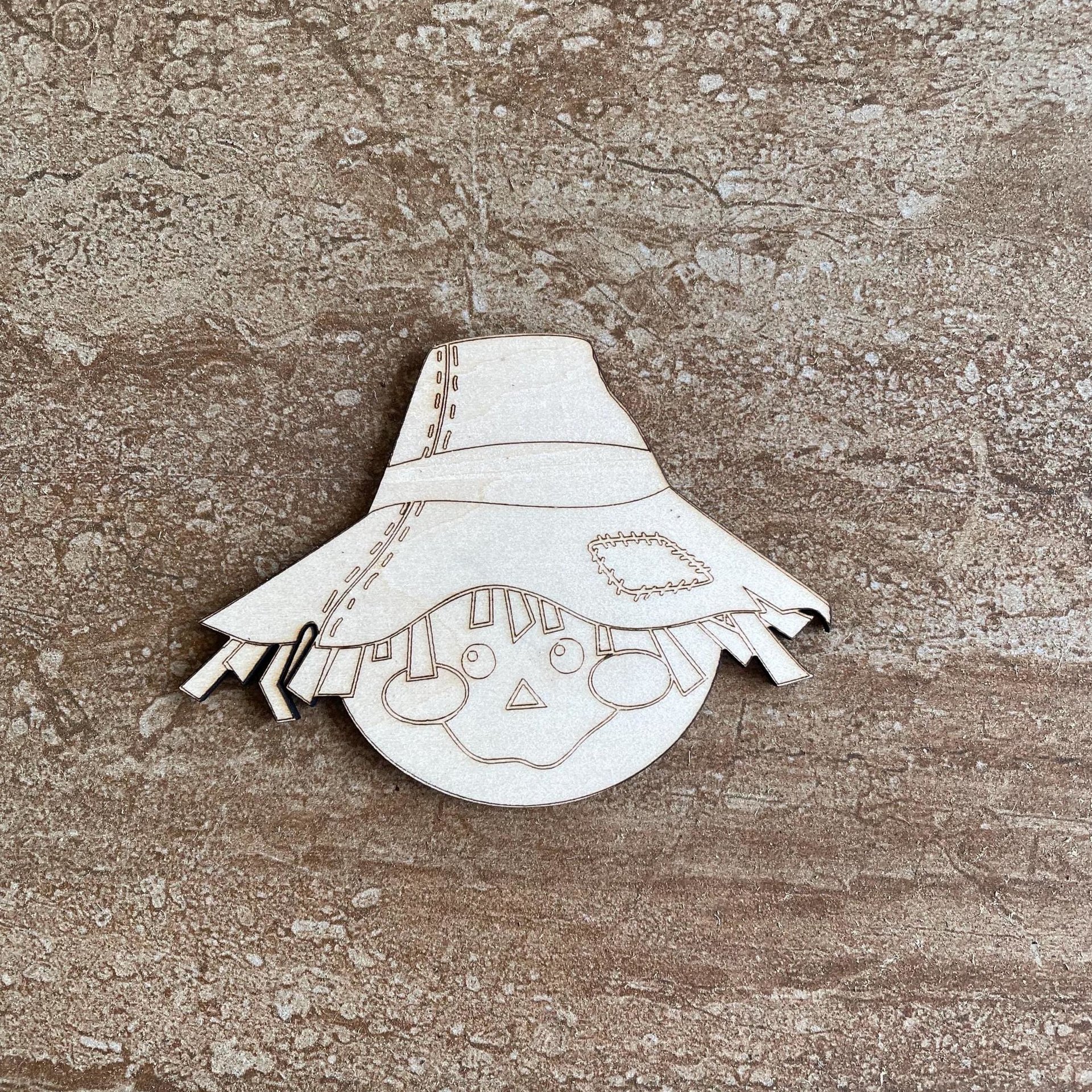 Handmade wooden DIY scarecrow cutout ready for paint or decorating