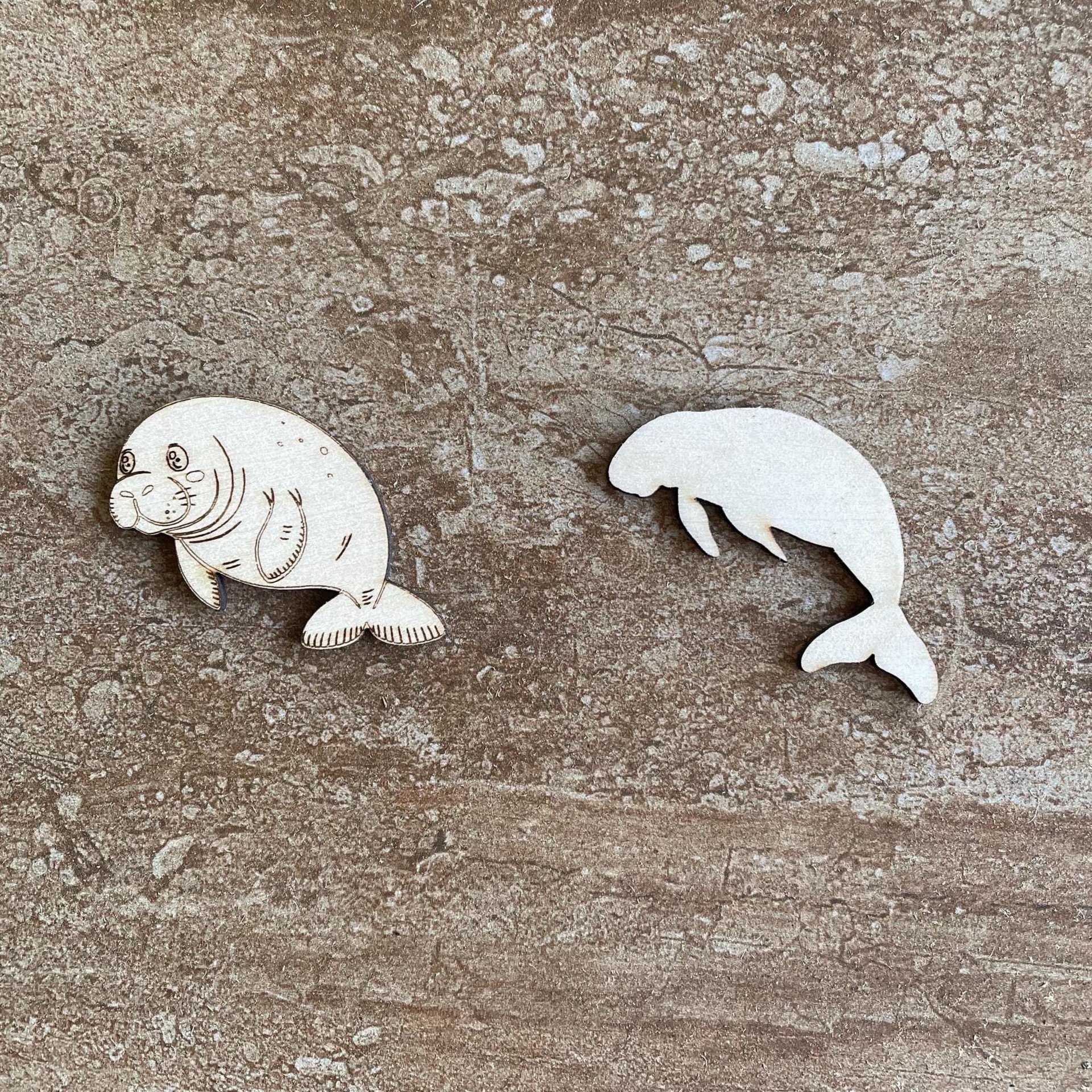 Handmade wooden DIY manatee cutout in two unique styles, ready for paint or decorating