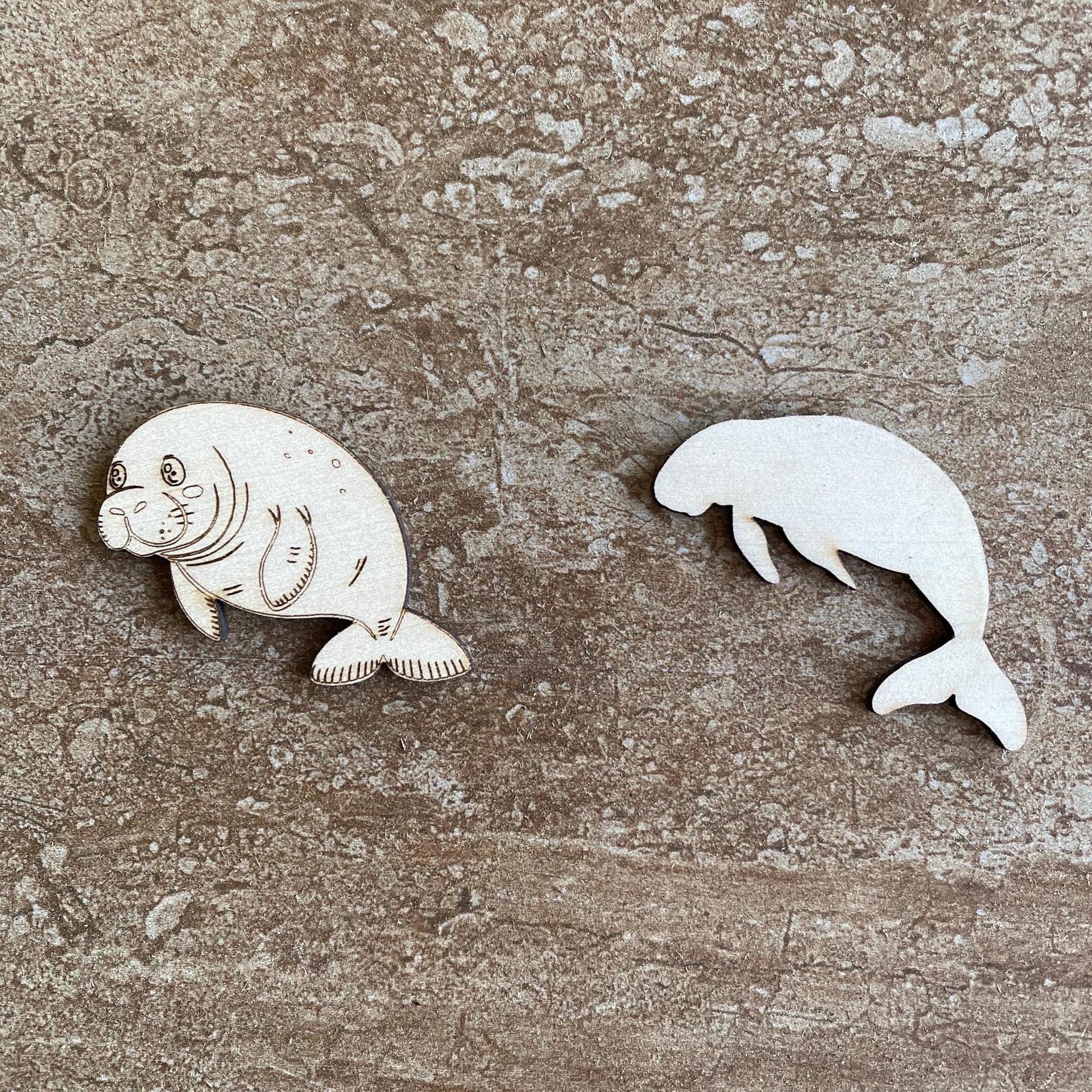 Handmade wooden DIY manatee cutout in two unique styles, ready for paint or decorating