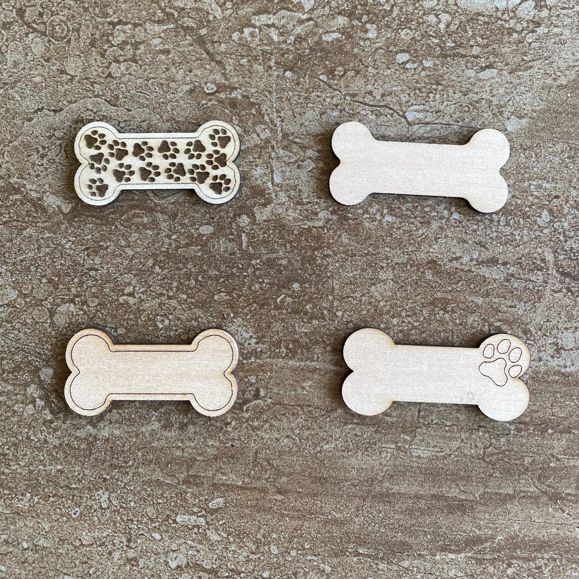 Handmade wooden DIY dog bone cutout in four unique styles, ready to paint or decorate