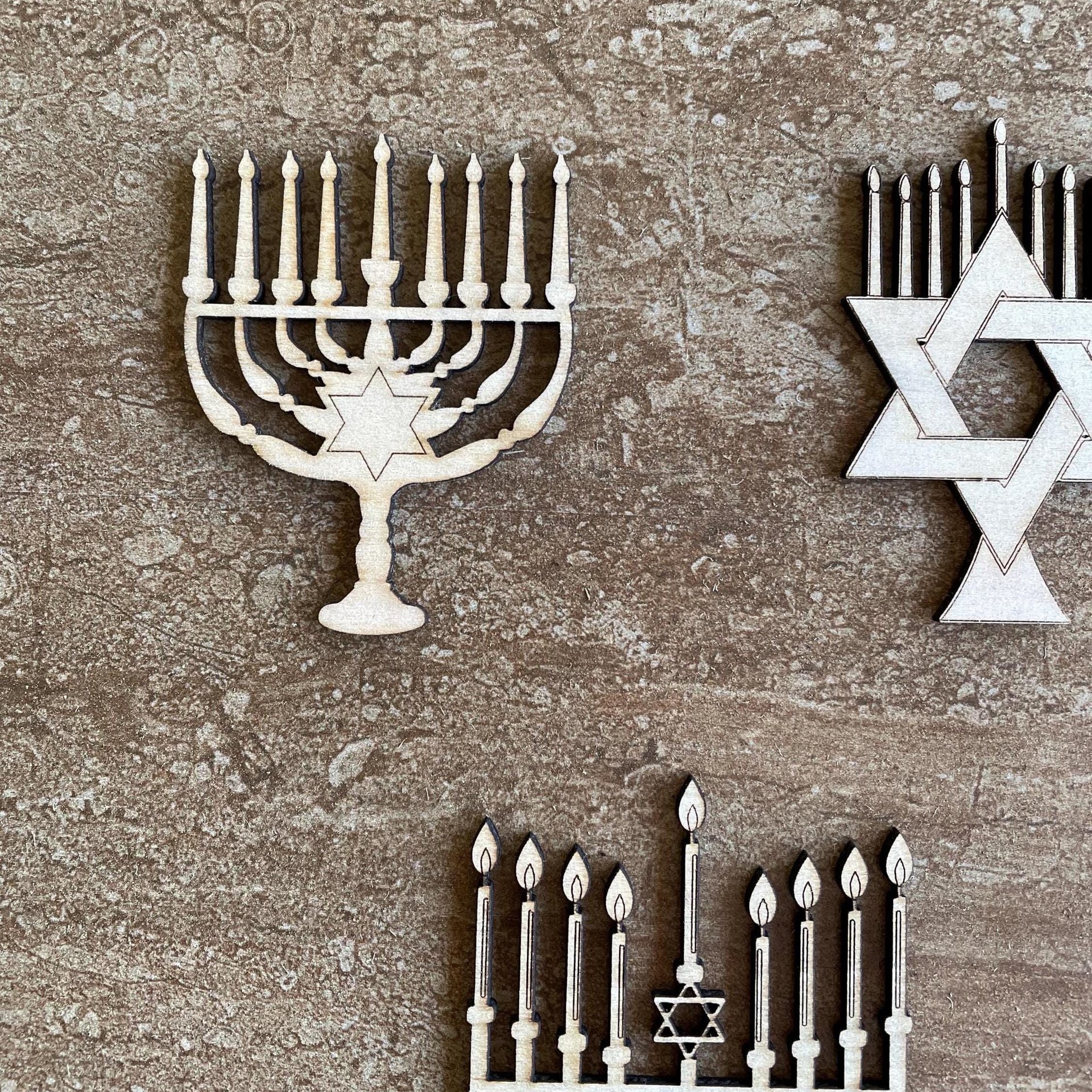 Handmade wooden DIY menorah cutout in three unique styles, ready for paint or decorating