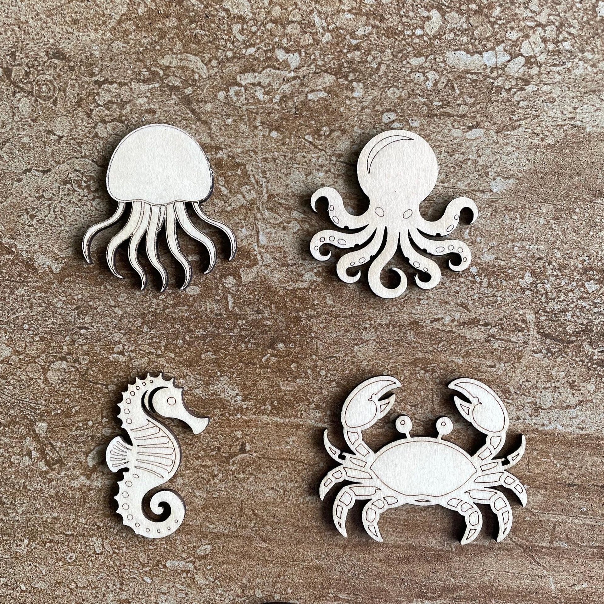 Handmade wooden DIY sea life cutout in four unique styles, ready for paint or decorating