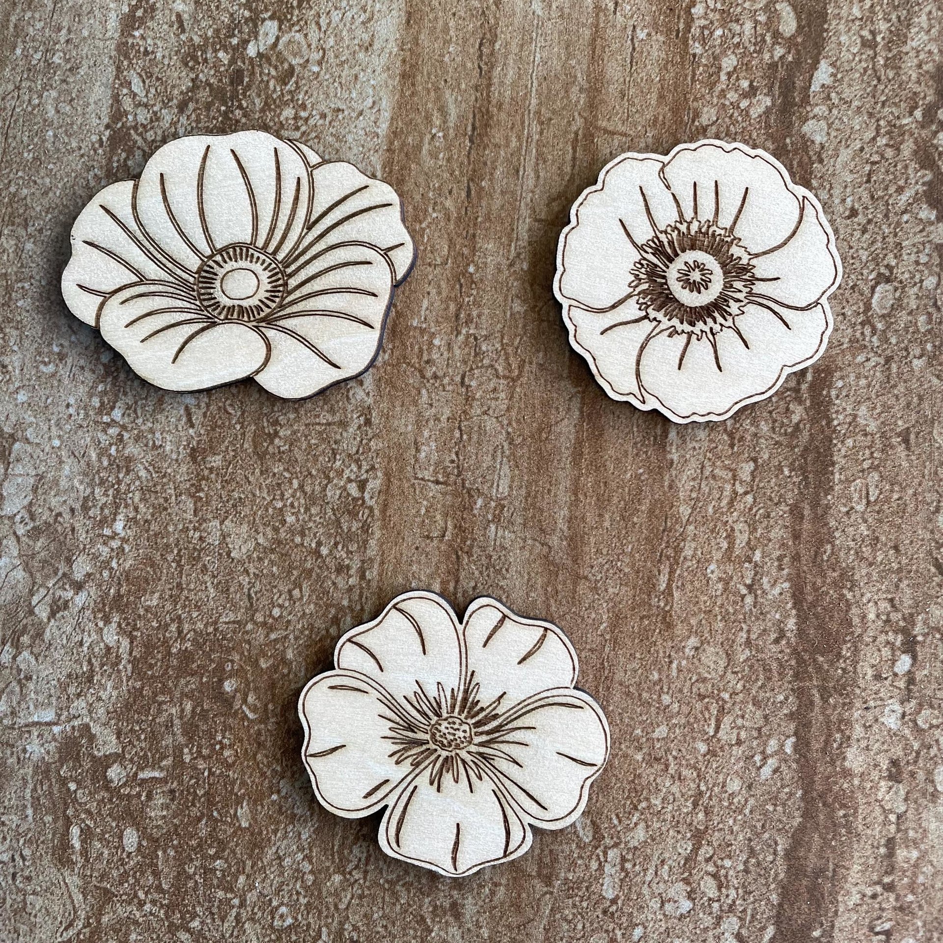 Handmade wooden DIY poppy flower cutout in three unique styles, ready for paint or decorating