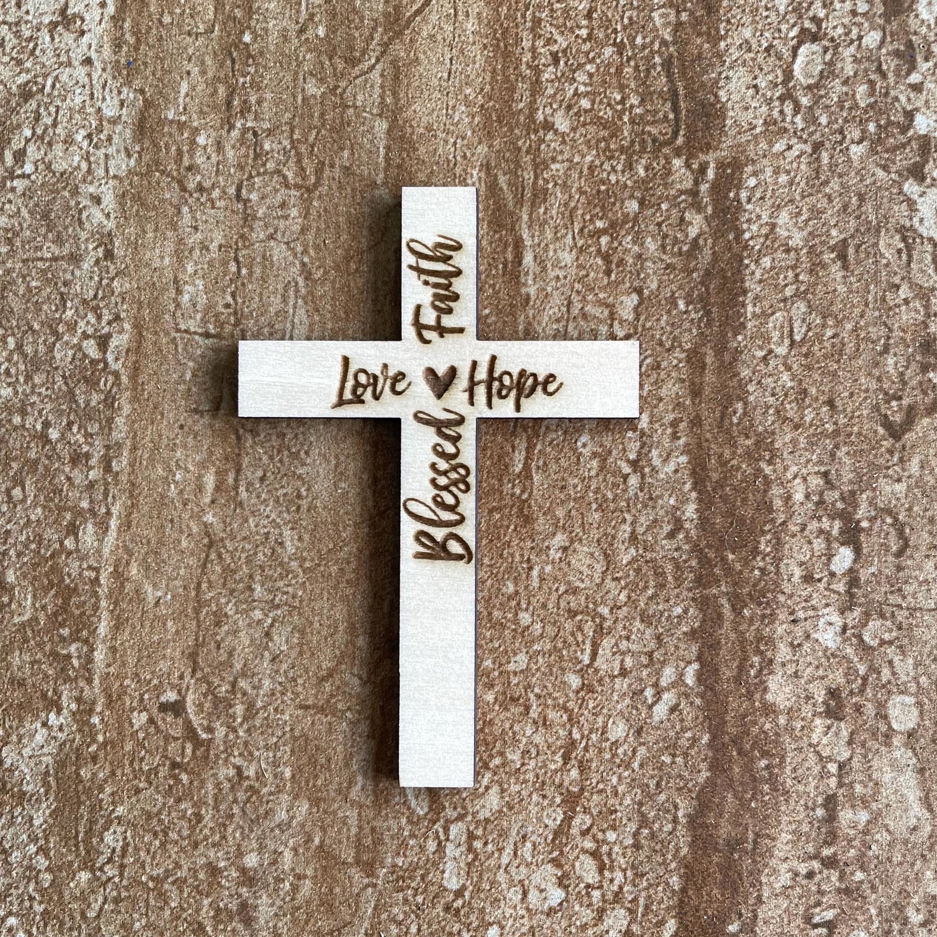 Handmade wooden DIY cross cutout ready for paint or decorating