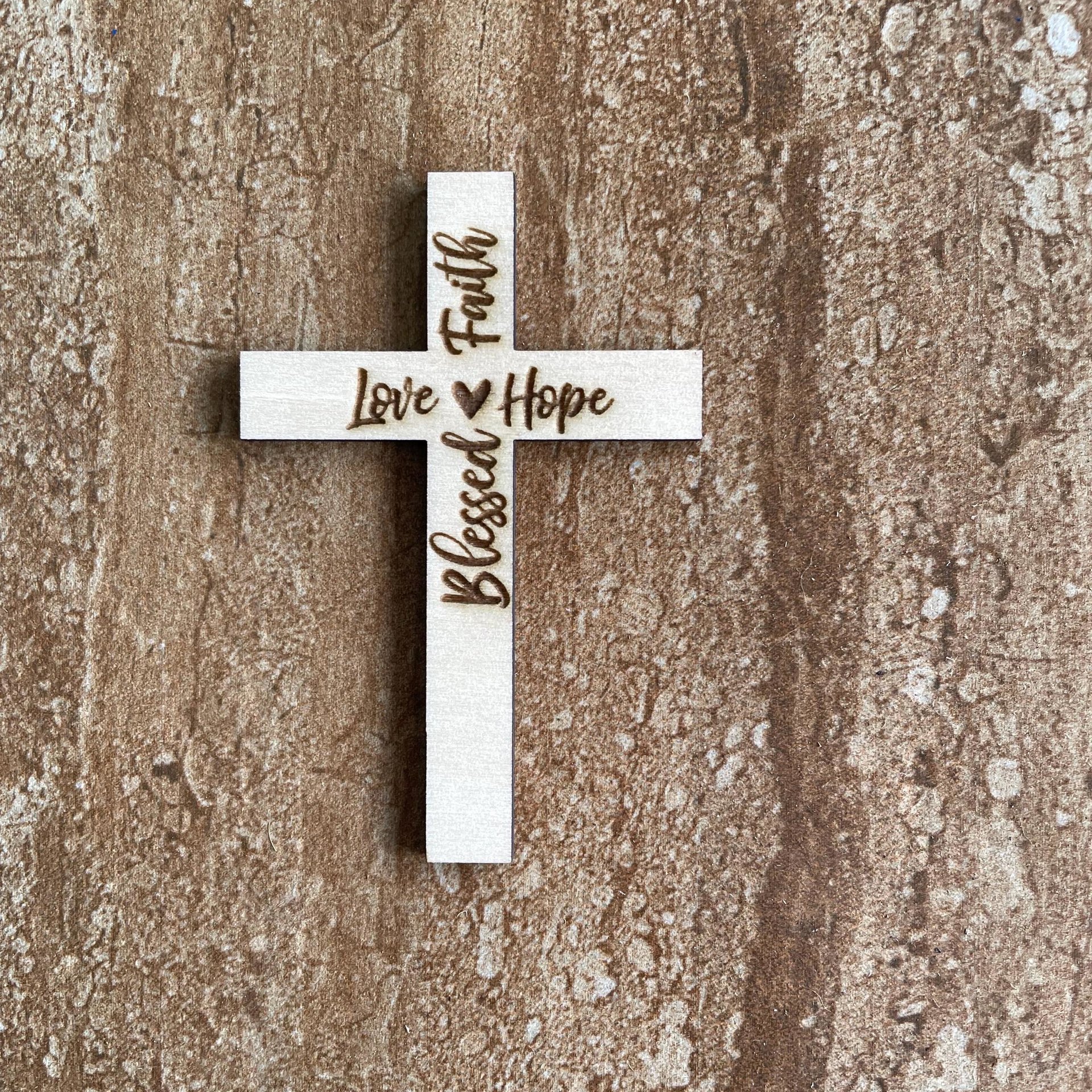 Handmade wooden DIY cross cutout ready for paint or decorating