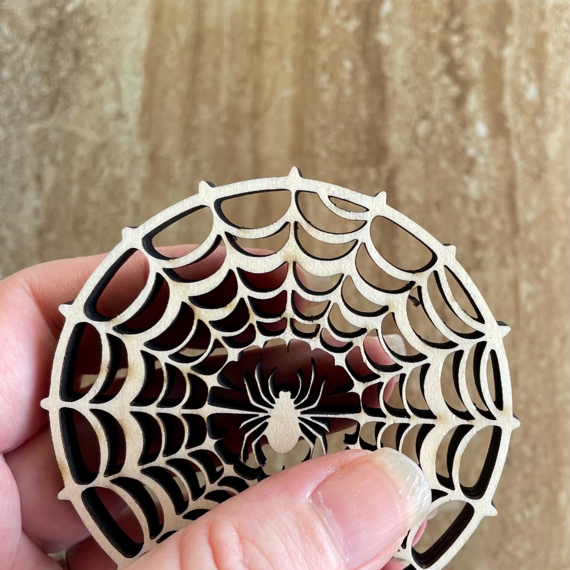 Handmade wooden DIY spider web cutout ready for paint or decorating