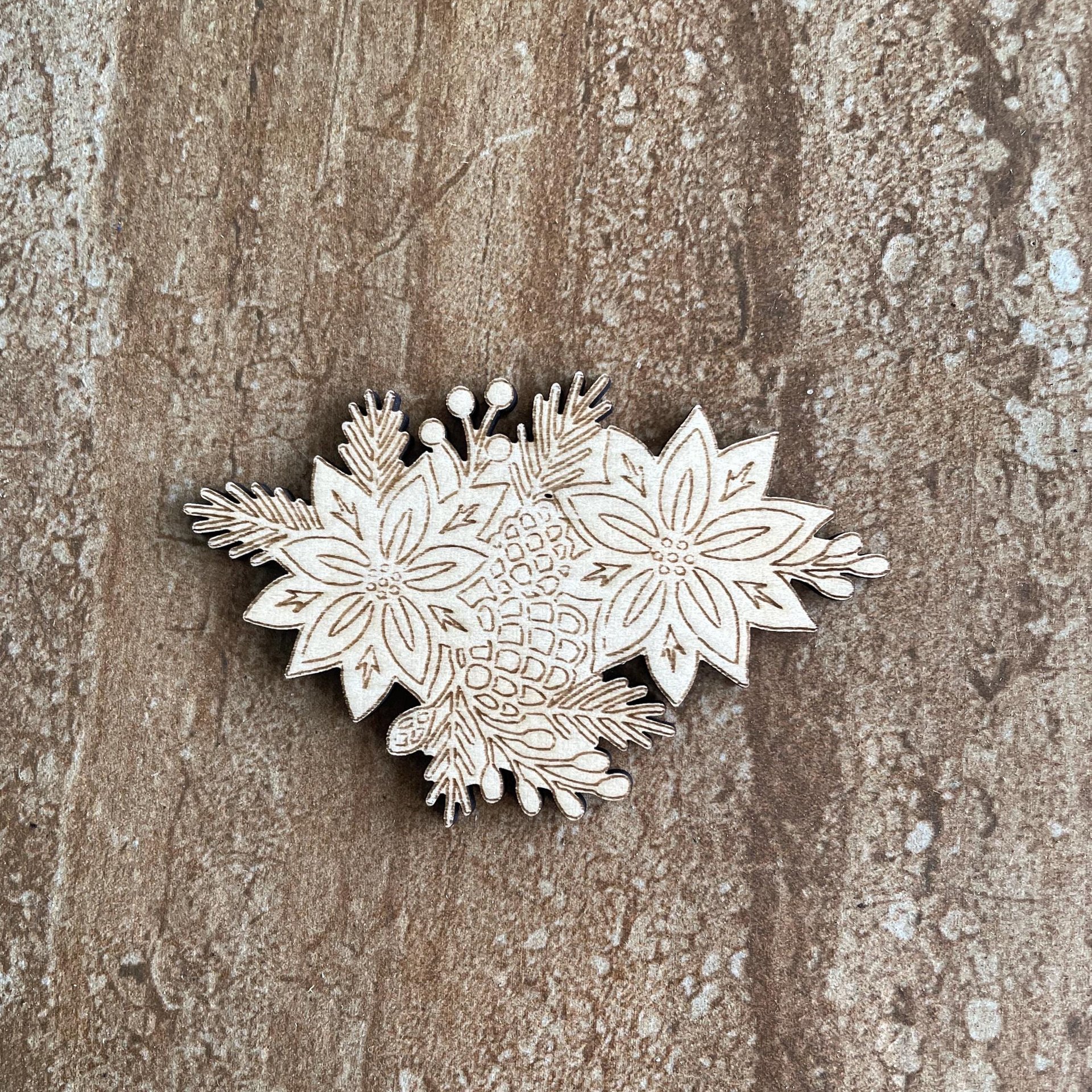 Handmade wooden DIY poinsettia cutout ready for paint or decorating