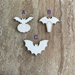 Handmade wood bat cutouts for Halloween crafts, available in three DIY styles