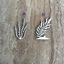 Handmade laser cut wood seaweed shapes in two different styles for DIY crafts