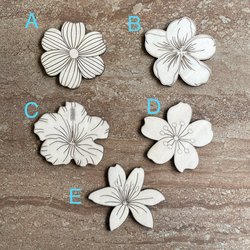 Handmade wooden DIY tropical flower cutouts in five unique styles, ready for paint or decorating
