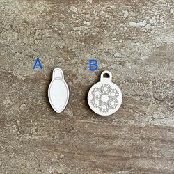 Handmade wooden DIY Christmas bulb cutout in two unique styles, ready for paint or decorating