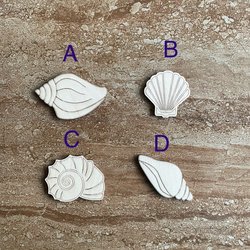 Handmade wooden DIY sea shell cutout in four unique styles, ready for paint or decorating