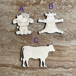 Handmade wooden DIY cow cutout in three unique styles, ready to paint or decorate