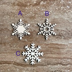 Handmade wooden DIY snowflake cutout in three unique styles, ready for paint or decorating