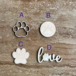 Handmade wooden DIY paw print cutout in four unique styles, ready to paint or decorate