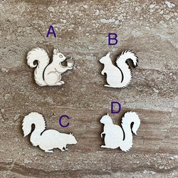 Handmade wooden DIY squirrel cutout in four unique styles, ready to paint or decorate
