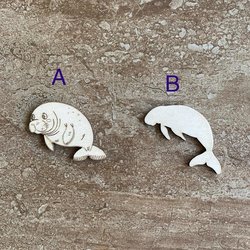 Handmade wooden DIY manatee cutout in two unique styles, ready for paint or decorating