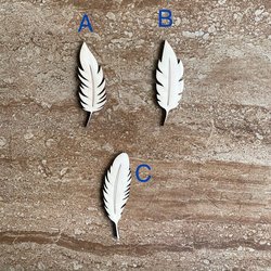 Handmade wooden DIY feather cutout in three unique styles, ready for paint or decorating