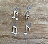 Handmade wooden DIY musical note cutout in four unique styles, ready for paint or decorating