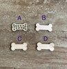 Handmade wooden DIY dog bone cutout in four unique styles, ready to paint or decorate