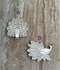 Handmade wooden DIY peacock cutout in two unique styles, ready to paint or decorate